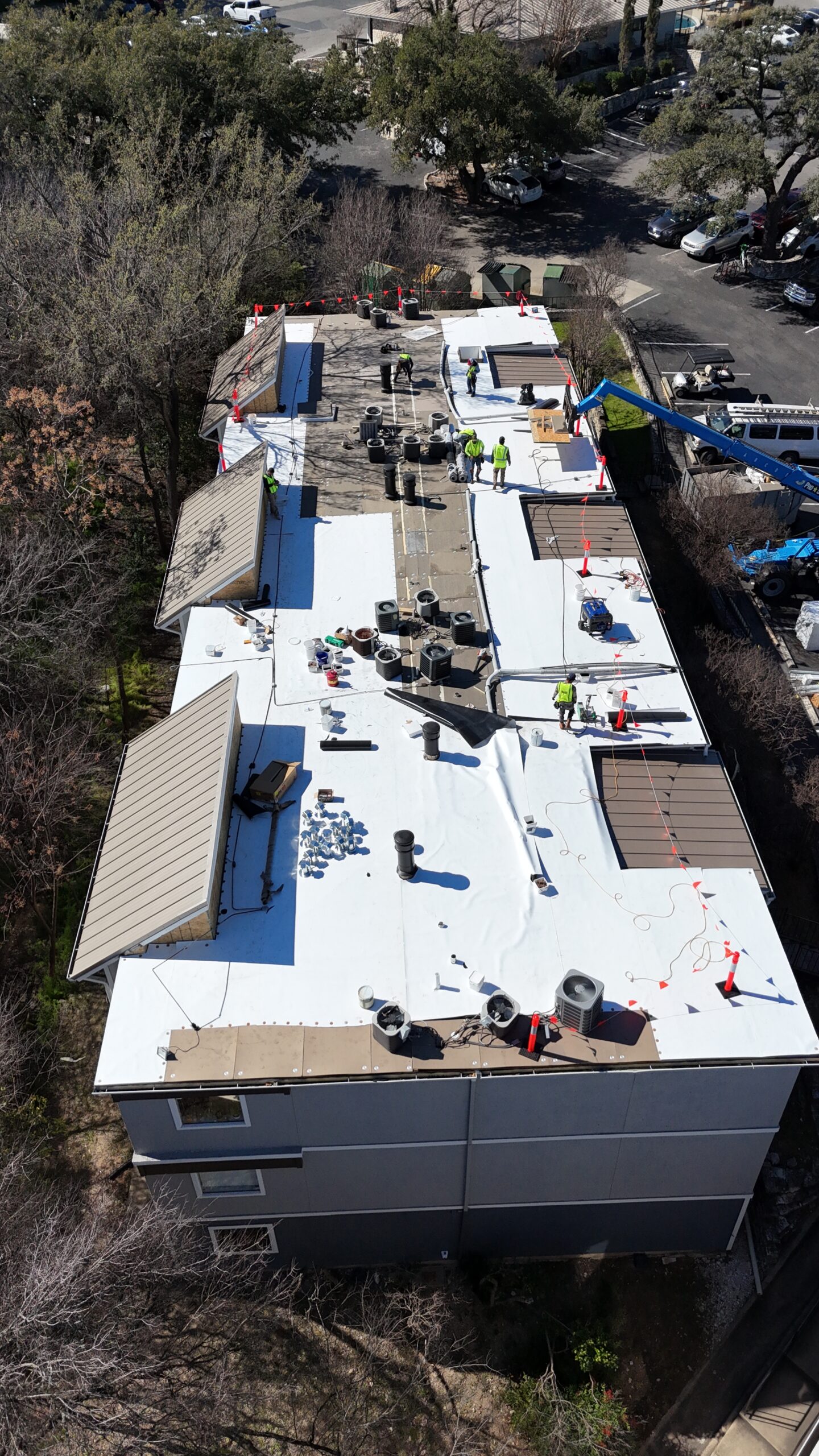 Aerial view of a commercial roofing installation in progress with the Monarch Texas Contracting LLC team.